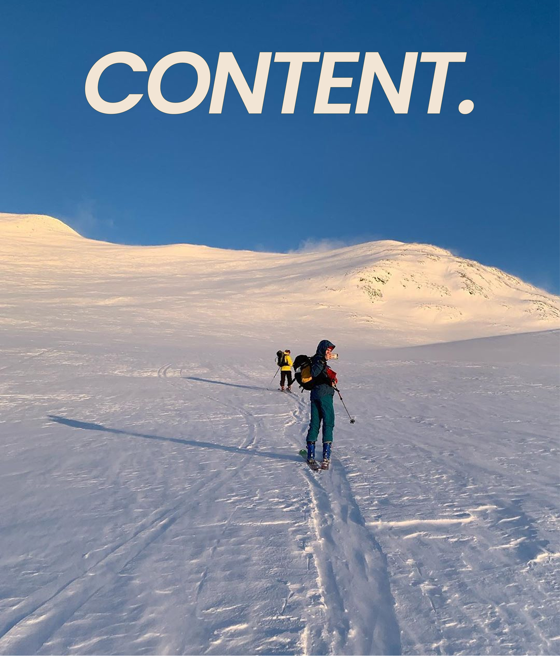 Portrait of the blog owner with face partially distorted through two clear glasses of water on a white table